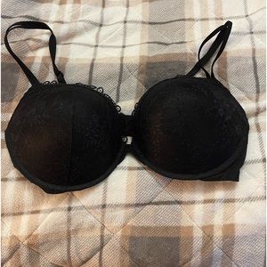 Victoria Secret very sexy push up bra in black lace with padding. Size is 38DD.